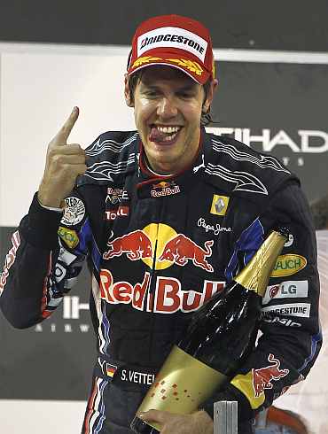 Sebastian Vettel celebrates after winning the Abu Dhabi GP
