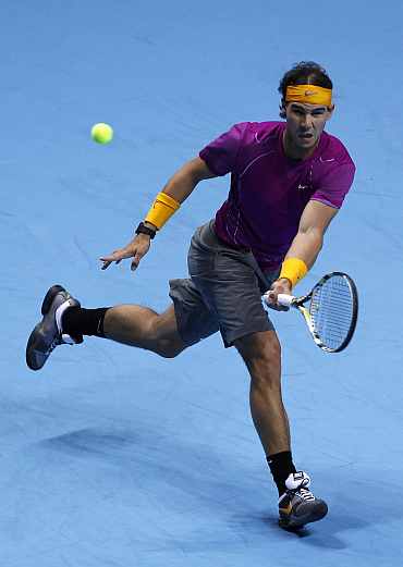 Rafa Nadal returns to Andy Roddick at the ATP World Tour Finals in London