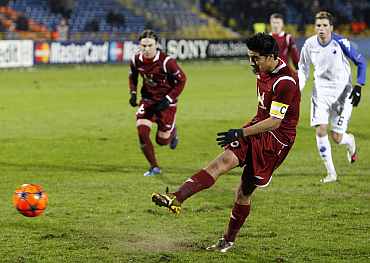Rubin Kazan's Christian Noboa scores from a penalty during their match against FC Copenhagen