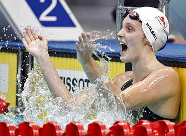 Fran Halsall reacts after winning the gold
