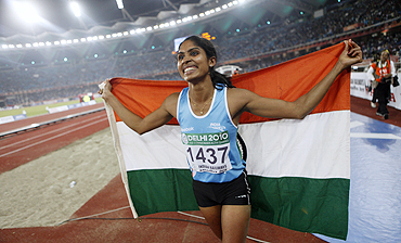 Prajusha Maliakkal celebrates after wining the silver medal in the women's long jump final on Sunday