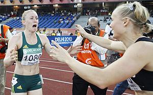 Sally Pearson cries after winning the 100m hurdles final