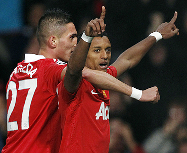 Manchester United's Nani (right) celebrates with Federico Macheda after scoring