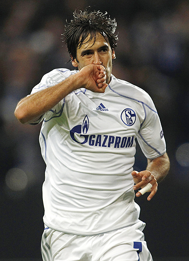 Schalke 04's Raul celebrates after scoring
