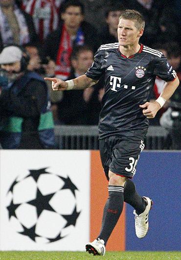 Bayern Munich's Bastian Schweinsteiger celebrates after scoring against FC Basel