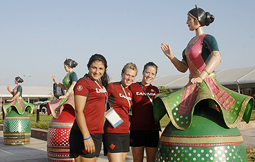 Canada's field hockey players Anna Kozniuk, Diana Roemer and Abigail Raye enjoy a day out at the Commonwealth Games Village