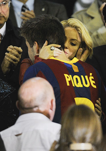Shakira comforts Barcelona's Gerard Pique after the Copa del Rey final on Wednesday