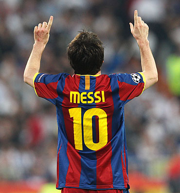 Lionel Messi celebrates after scoring his second goal