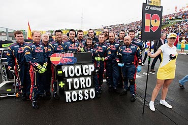Scuderia Toro Rosso celebrate their 100th Grand Prix during the Hungarian Grand Prix at the Hungaroring on Sunday
