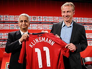 US soccer president Sunil Gulati (left) officially unveils Jurgen Klinsmann (right) as the new head coach of the US men's team