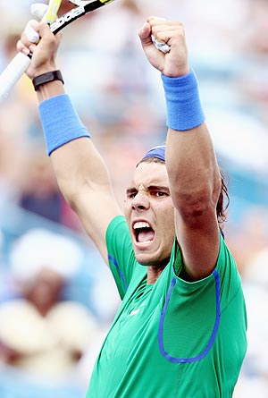 Rafael Nadal celebrates after defeating compatriot Fernando Verdasco
