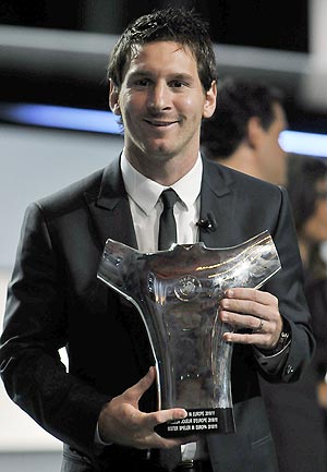 Barcelona's Lionel Messi with the Best Player in Europe award