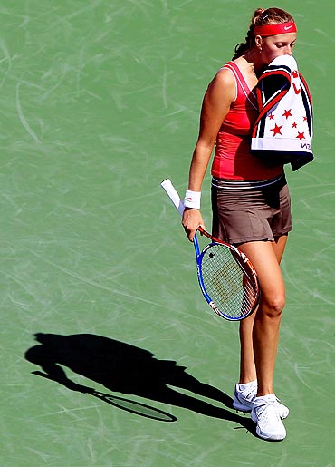 Petra Kvitova reacts during her match against Alexandra Dulgheru