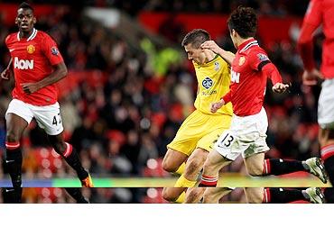 Darren Ambrose of Crystal Palace scores the opening goal during the Carling Cup quarter-final match against Manchester United