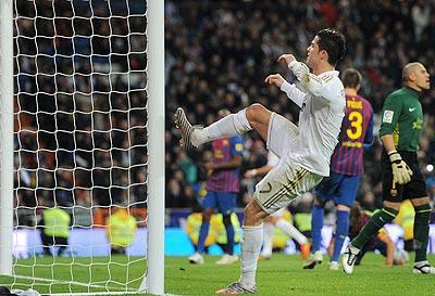 Cristiano Ronaldo of Real Madrid kicks the goalpost out of frustration as he fails to score