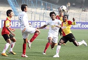 East Bengal players in action with Pailan Arrows' players