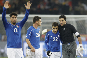 (L to R) Italy's Marco Borriello, Christian Maggio, Giuseppe Rossi and goalkeeper Gianluigi Buffon react after their international friendly soccer match against Germany in Dortmund
