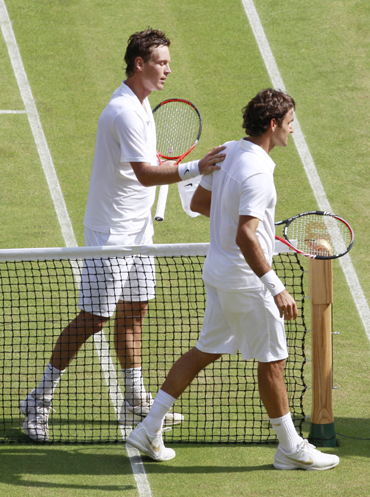 Tomas Berdych and Roger Federer