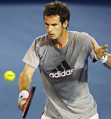 Britain's Andy Murray returns the ball during a training session at Melbourne Park