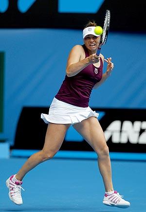 Vera Zvonareva of Russia hits a return against Sybille Bammer of Austria