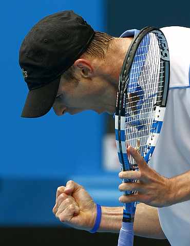 Andy Roddick reacts after winning his match at the Australian Open