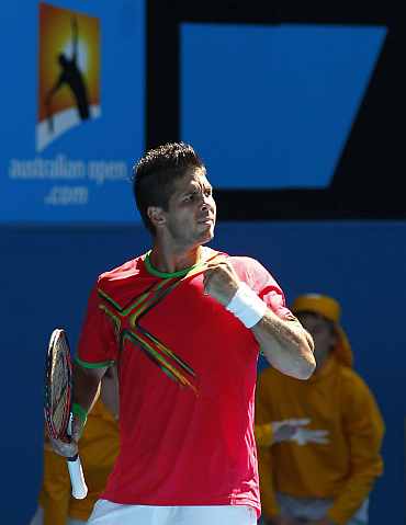 Fernando Verdasco reacts after winning his match against Janko Tipsarevic at the Australian Open