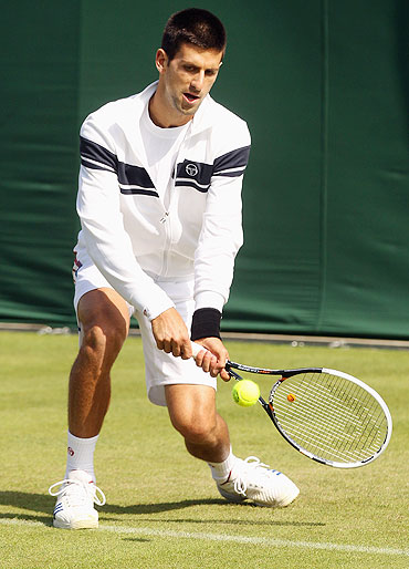 Novak Djokovic trains