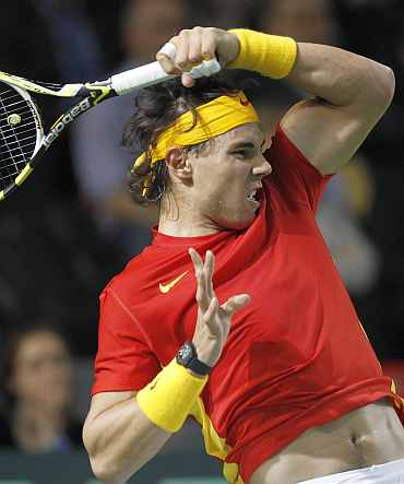 Spain Rafa Nadal returns during his Davis Cup match