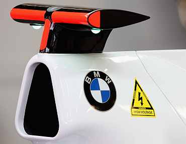 Team BMW Sauber car displays a warning sign for high voltage due to the new KERS energy system