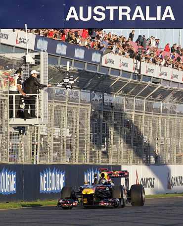 Red Bull's Sebastian Vettel crosses the line winning the Australian Grand Prix