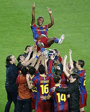Barcelona players celebrate after winning the Champions League semis