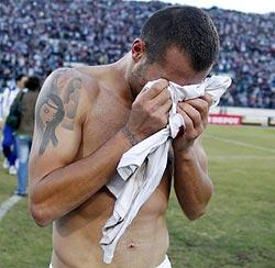 Lebanon's Ramez Dayoub cries after his team beat South Korea in their 2014 World Cup qualifier