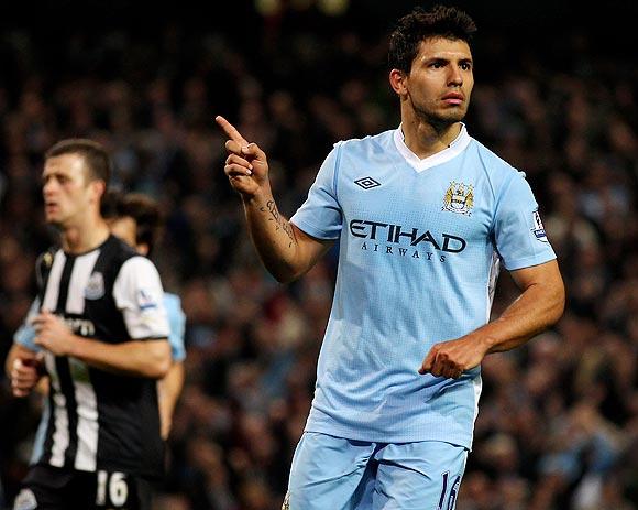 Sergio Aguero celebrates after scoring against Newcastle