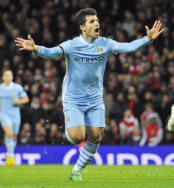 Manchester City's Sergio Aguero celebrates after scoring against Arsenal on Tuesday