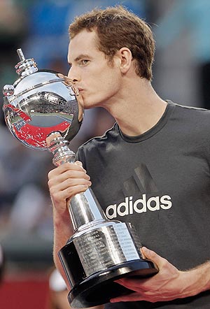 Andy Murray with the Japan Open trophy after defeating Rafael Nadal on Sunday