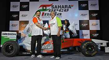 Vijay Mallya, co-owner of the Force India Formula One team and Sahara Group Chairman SubrataRoy attend a news conference in New Delhi