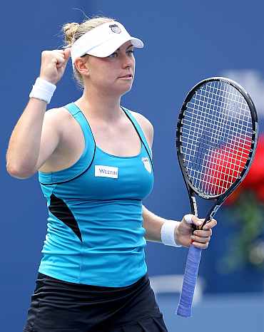 Vera Zvonareva celebrates after winning her match