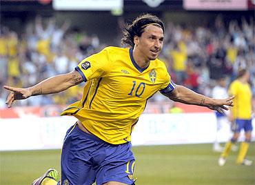 AC Milan's Zlatan Ibrahimovic celebrates after scoring a goal