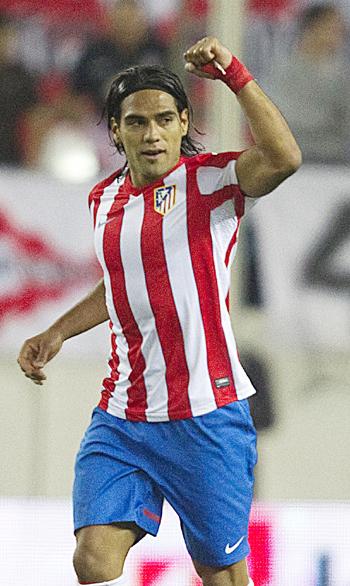 Atletico Madrid's Radamel Falcao celebrates after scoring a goal against Celtic during their Europa League Group I soccer match at Vicente Calderon stadium in Madrid