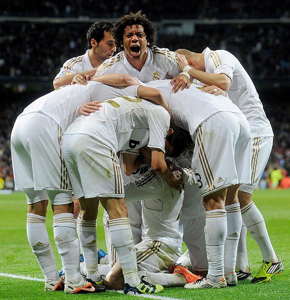 Real Madrid's players celebrate after Cristiano Ronaldo scored a goal on Sunday