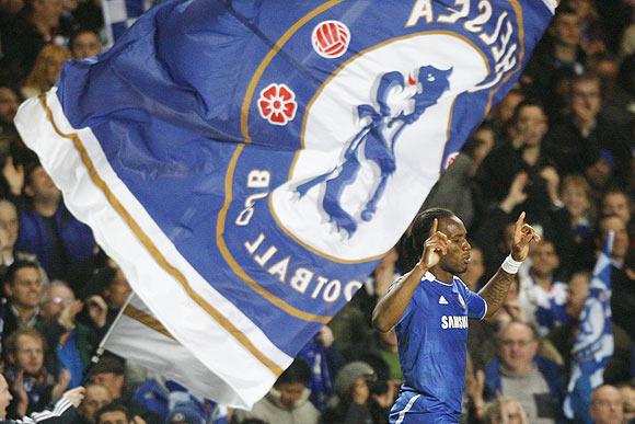 Drogba of Chelsea celebrates scoring against Barcelona