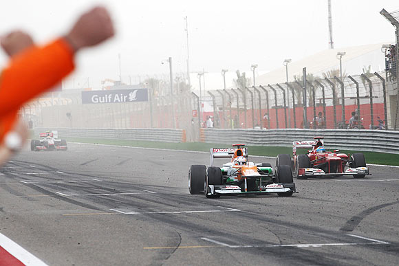 A Force India car races during the Bahrain GP on Sunday