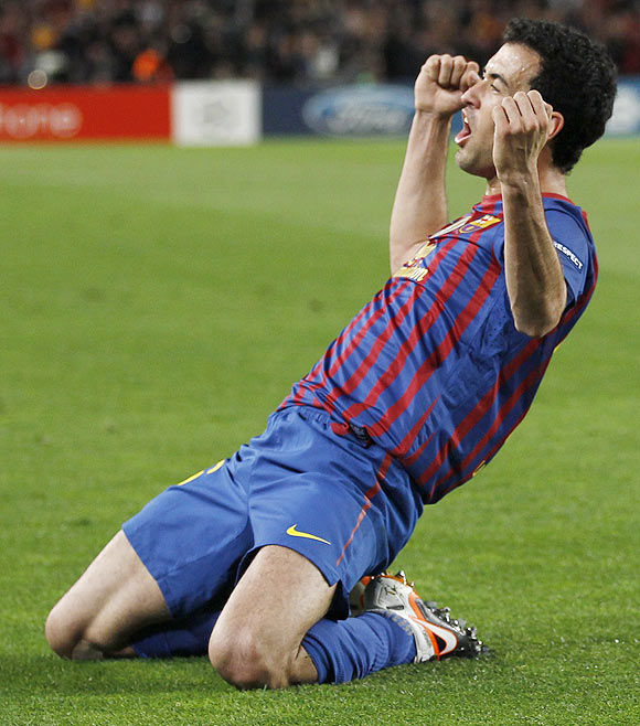 Barcelona's Sergio Busquets celebrates after scoring the opening goal against Chelsea on Tuesday