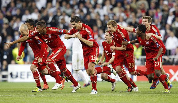 Bayern Munich's players react after beating Real Madrid via penalties in their Champions League semi-final on Wednesday