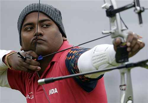 India's Jayanta Talukdar shoots during an elimination round of the individual archery competition