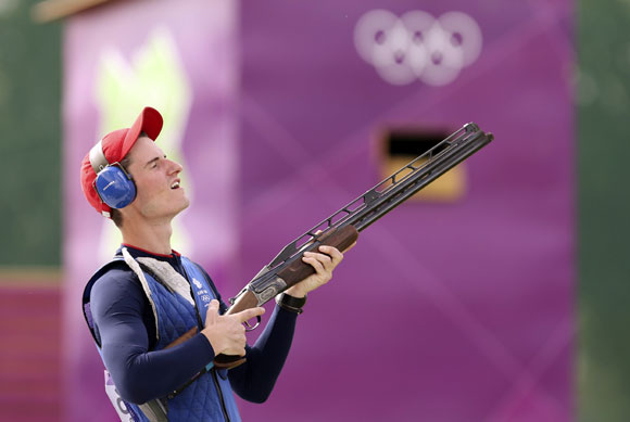 Britain's Peter Robert Russell Wilson celebrates after winning in the men's double trap shooting event