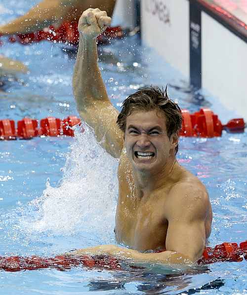 United States' Nathan Adrian celebrates his gold medal win in the men's 100-meter freestyle swimming final