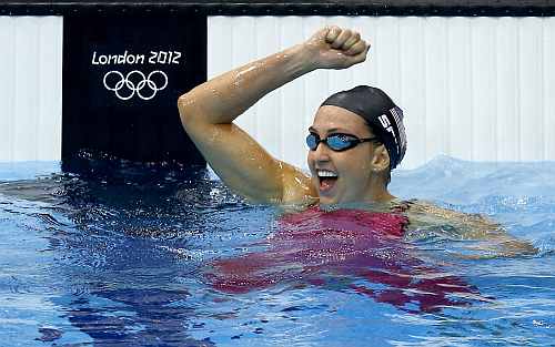 United States' Rebecca Soni reacts to her record-setting finish in the women's 200-meter breaststroke swimming semifinal