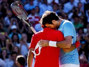 Federer is congratulated by Del Potro after the eipc match