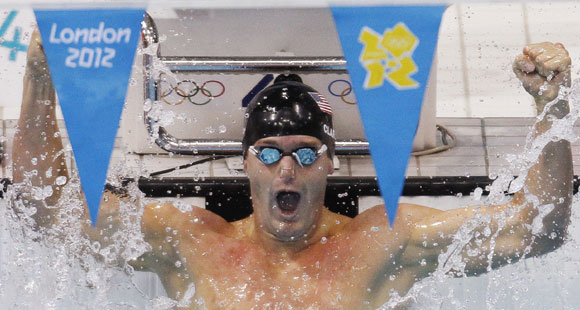 Tyler Clary of the U.S. celebrates winning the men's 200m backstroke final with an Olympic record